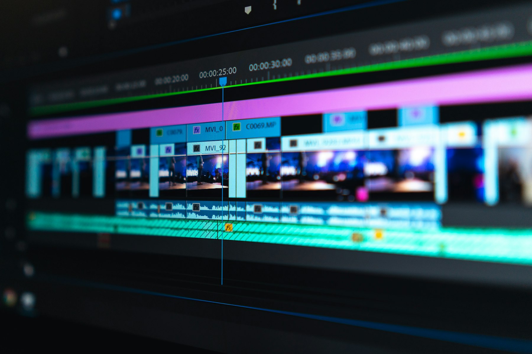 Professional video editor working on a timeline at a workstation